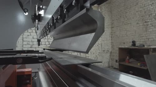 metal bending machine. metal bent. bending of metal. metal crafting