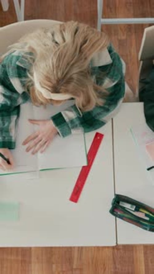 Learning, writing and exam with students in classroom for problem solving, assessment or education