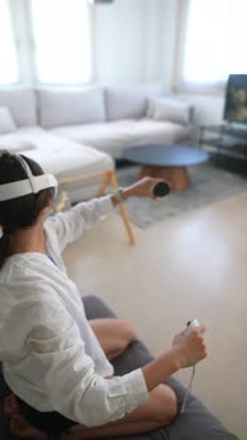Young Woman Using VR Headset in Living Room