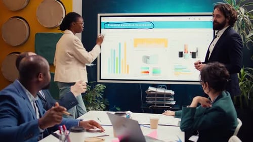 Employees Team Sharing Insight on Sales Statistics in Corporate Briefing Meeting