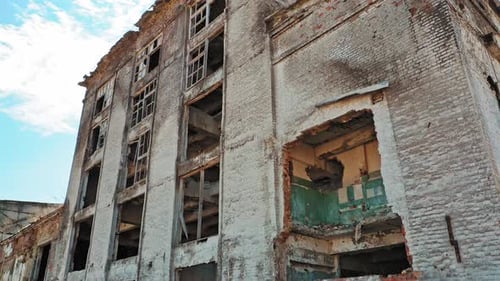 Old industrial building for demolition. Abandoned building exterior. Aerial view.