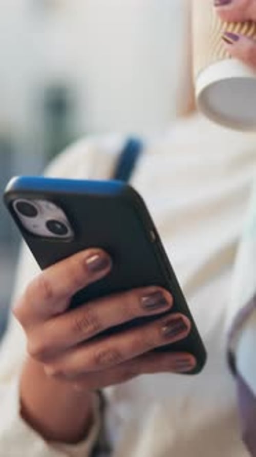 Phone, hands and businesswoman in city with texting, networking and communication on mobile app