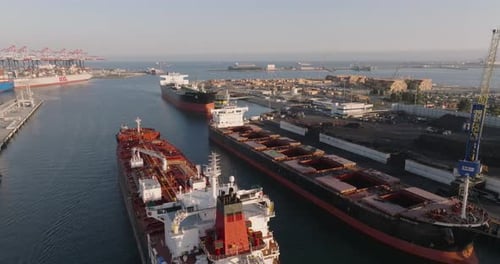 a group of ships in a harbor