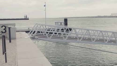 Empty Ferry Pier with Modern Infrastructure and Sea View