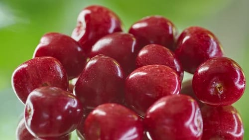 Closeup Cherries Spinning on a Stand