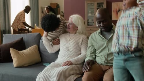 Grandparents With Grandchildren Gather at Home