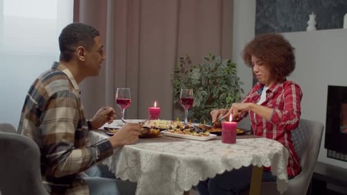 Loving Couple Enjoying Romantic Dinner at Home