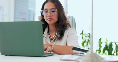 Laptop, reading and female working in the office on a business report, analysis or proposal