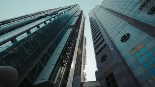 Low Angle View Of Tall Modern Skyscrapers Against Clear Sky