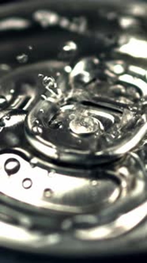 Super Slow Motion on a Tin with Beer Dripping waterFilmed on a Highspeed Camera at 1000 Fps