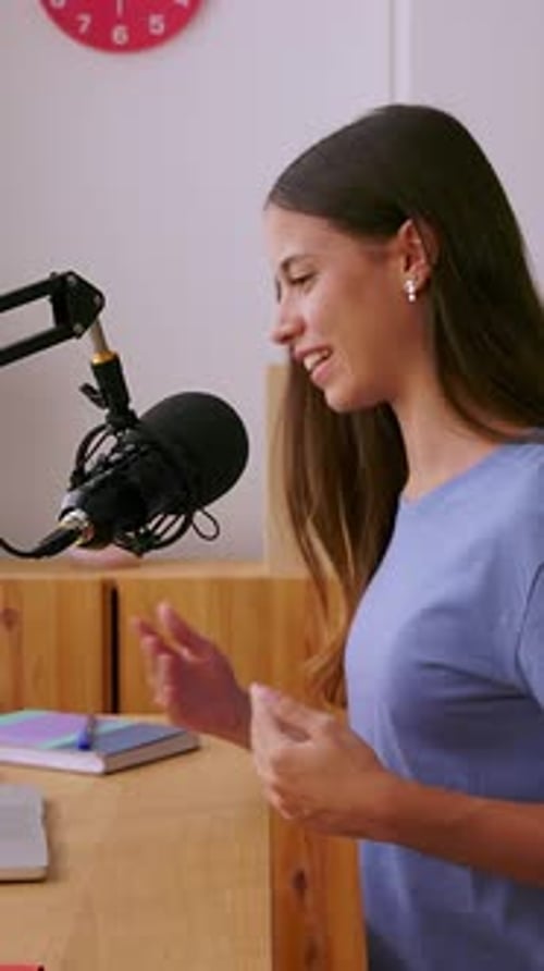 Teenage Student Girl Recording Podcast in Bedroom with Laptop and Microphone