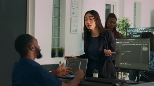 Diverse Database Developers Doing Highfive Gesture with Colleague Programer