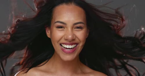 Smiling Woman with Flowing Hair Close Up