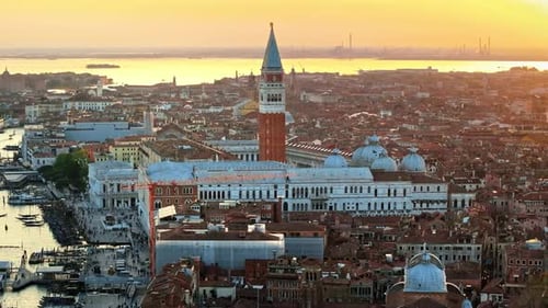 Aerial drone view of St. Mark's Square in Venice City, Italy, at sunset