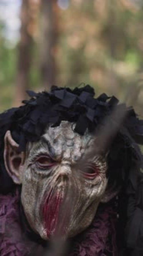 Scary Demons Look for Lost Travelers in Forest Closeup