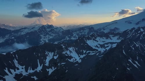 Aerial View Beautiful Enticing Snowy Mountains Amid Cloudy Sky Beauty of Enticing Snowy Mountains