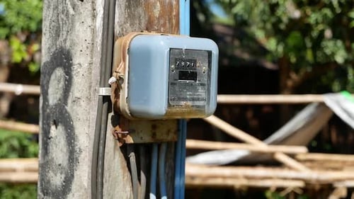 Close Up Footage of Electricty Meter in Rural Villlge, Thailand