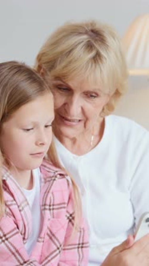 Grandmother and Granddaughter on a Video Call