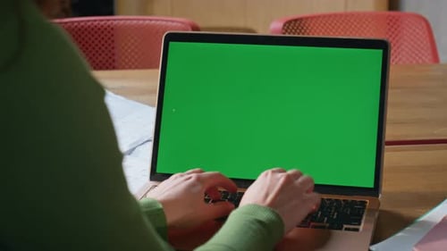 Hands Typing on Laptop with Green Screen