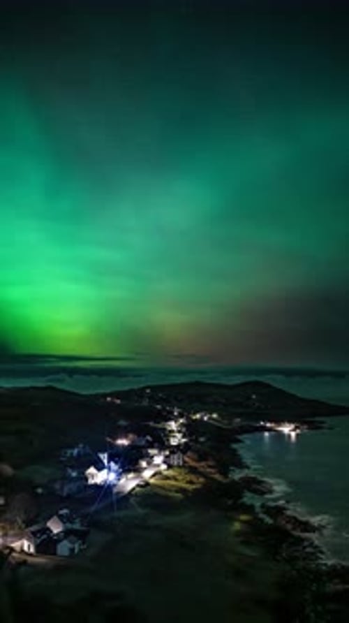 The Aurora Borealis the Northern Lights Showing Up Above Portnoo in County Donegal Ireland