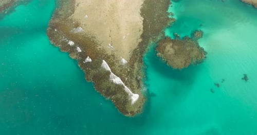 Aerial View of Tropical Island Coastline