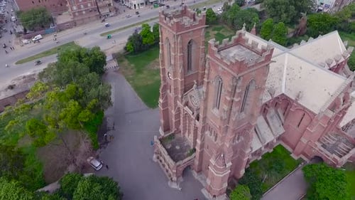 Aerial view of a beautiful Church building, Traffic is moving on the other side road of the Church,