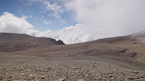 Mountain Range Under Cloudy Blue Sky
