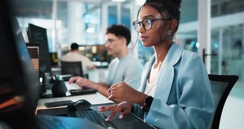 Arms crossed, face and smile of programmer woman at desk in office as graphic designer for software