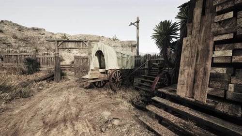 Un vagón rústico cubierto en una polvorienta carretera rural