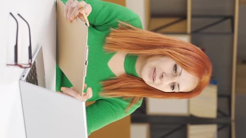 Vertical video of Mature businesswoman in online meeting.