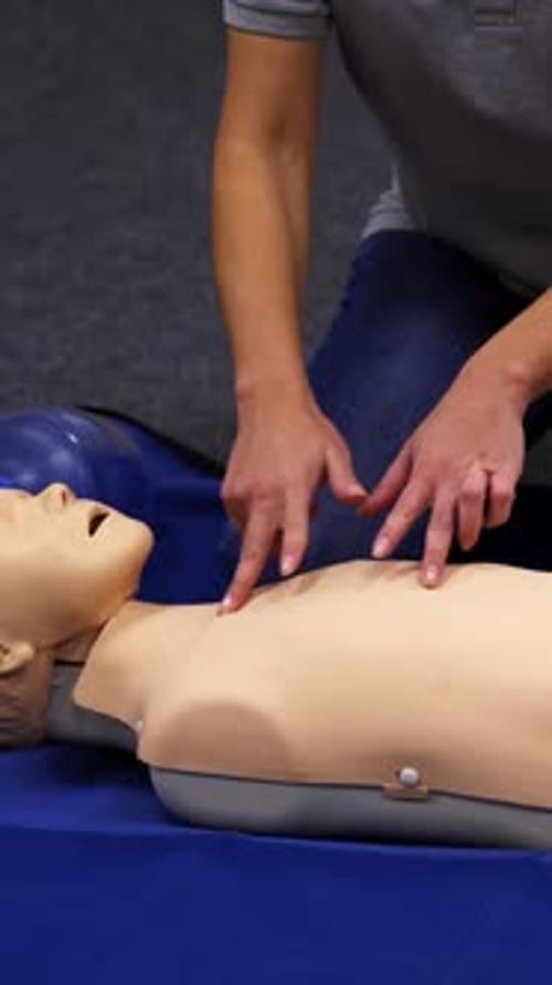 CPR Training Demonstration on Medical Mannequin
