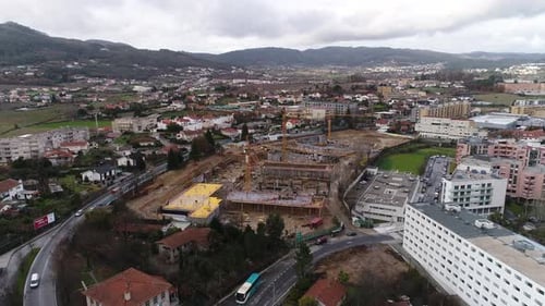 Flying Over New Building Construction in the City