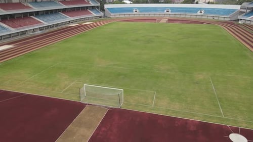 Aerial drone shot of a turf net in around soccer field