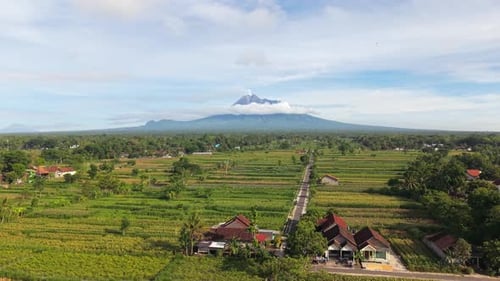 Aerial view of fields and Mount Merapi, Indonesia.