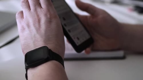 Man scrolling social media in smartphone