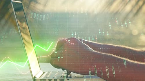 Hands typing on laptop with green chart overlay for communication and trade concept
