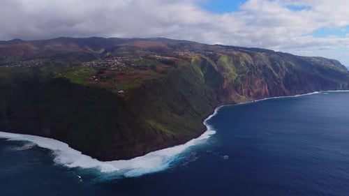 Aerial View of Madeira Cliffs and Atlantic Surf in Portugal