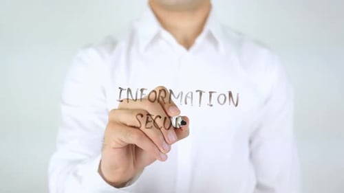 Man Writing Information Security with Marker