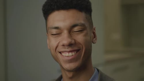 Young Man Smiling and Laughing Close Up