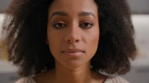 Extreme Close Up Headshot Indoors Female Portrait African American Woman Girl Serious Calm Face