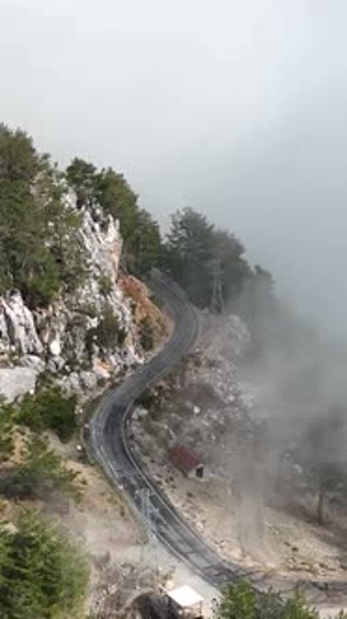 Vertical Video Cloudy Landscape in the Mountains Aerial View