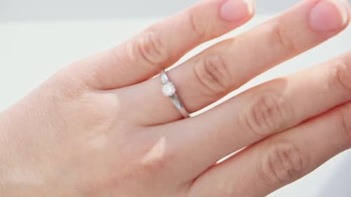 Close Up of Woman Hand with the Ring on the Girl's Finger