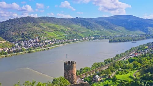 Scenic aerial panoramic view of the Rhine River Valley featuring small river side towns & vineyards