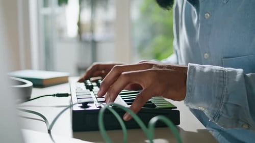 Producer Hands Typing Console Indoors Closeup. Unrecognizable African American Sound Engineer Mixing