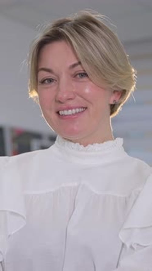 A Beautiful Smile of a Middleaged Woman Looking Into the Camera Vertical Video