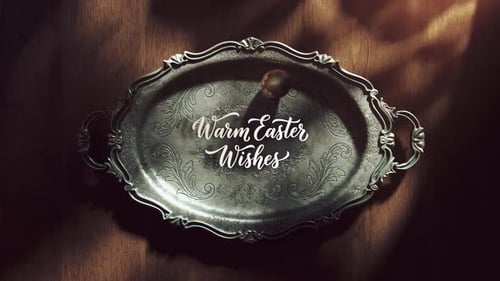 Elegant Easter Wishes with Rolling Egg on Ornate Tray