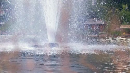 Garden Fountain. Splashing Streams of Water Fountain in . Water Fountain