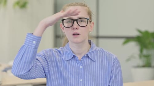 Portrait of Young Woman Searching for Opportunity