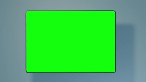 O telefone se eleva acima da superfície e se transforma em um tablet gráfico. Tela verde