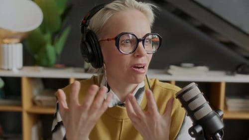 Female Podcast Host Talking in Mic and Smiling during Recording Session